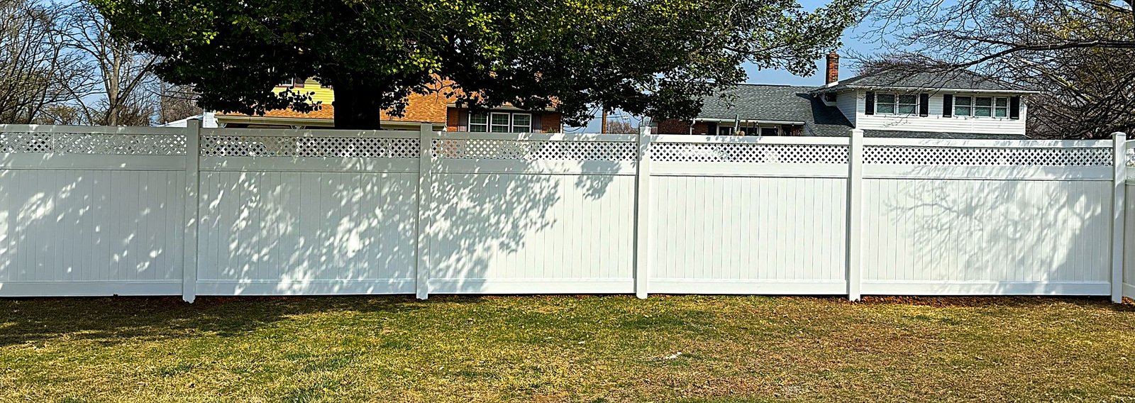 White vinyl privacy fence background
